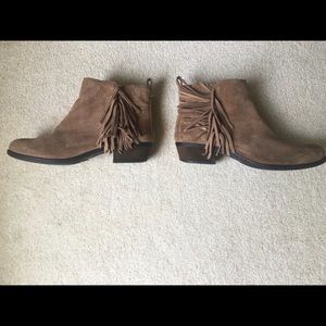 Beige ankle booties with tassel